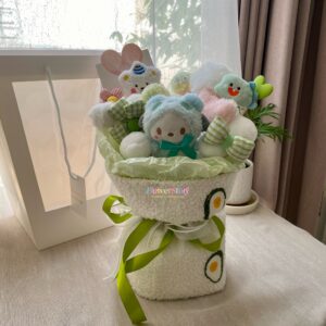Mẫu bó hoa được làm từ các chú gấu bông tone màu xanh bơ